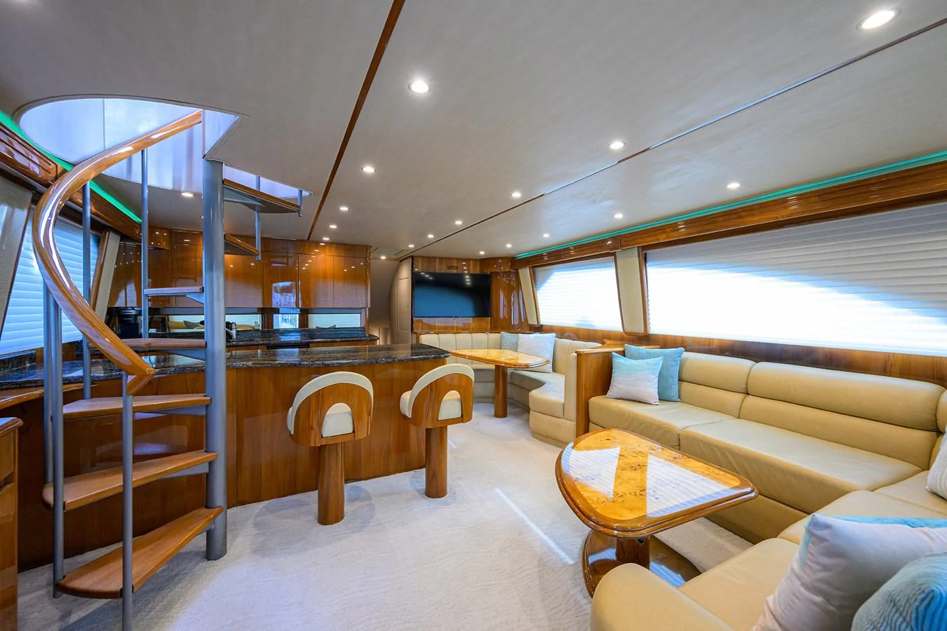 a room with a couch and a table and a tv aboard MARLIN MONROE Yacht for Sale
