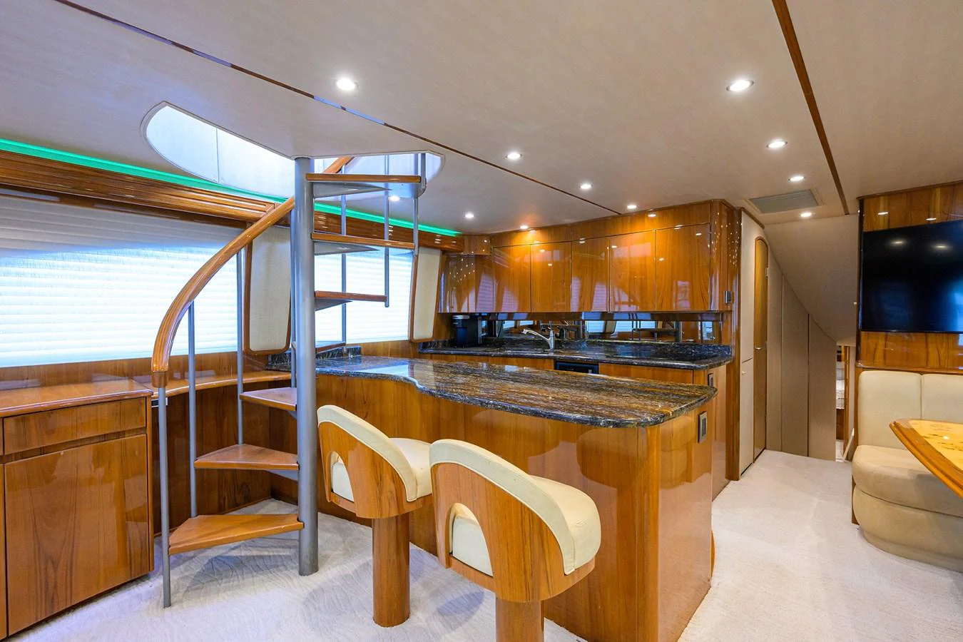 a large kitchen with a table aboard MARLIN MONROE Yacht for Sale