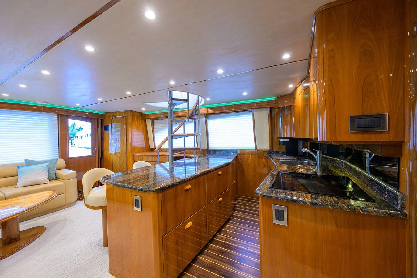 a kitchen with a large island aboard MARLIN MONROE Yacht for Sale