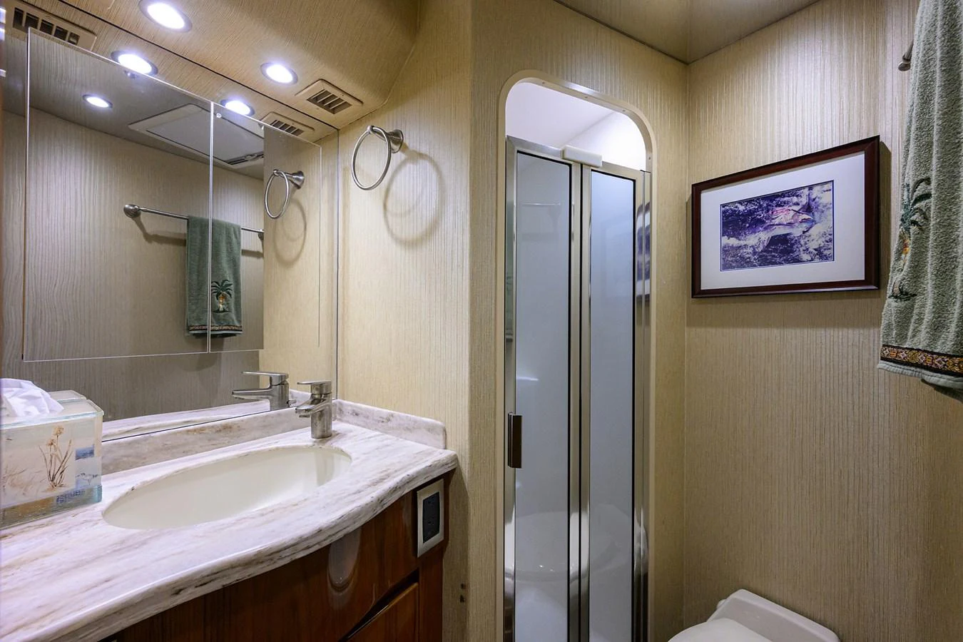 a bathroom with a sink and a mirror aboard MARLIN MONROE Yacht for Sale