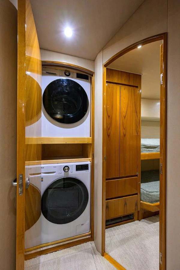 a washer and dryer in a bathroom aboard MARLIN MONROE Yacht for Sale