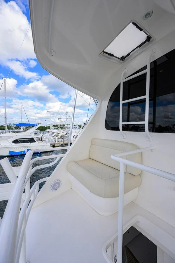 a white boat with a white canopy aboard MARLIN MONROE Yacht for Sale
