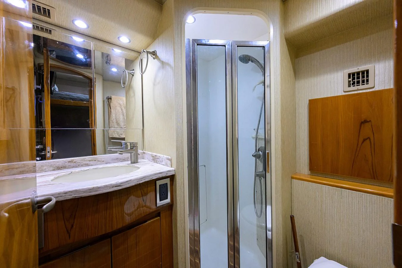 a bathroom with a glass shower aboard MARLIN MONROE Yacht for Sale