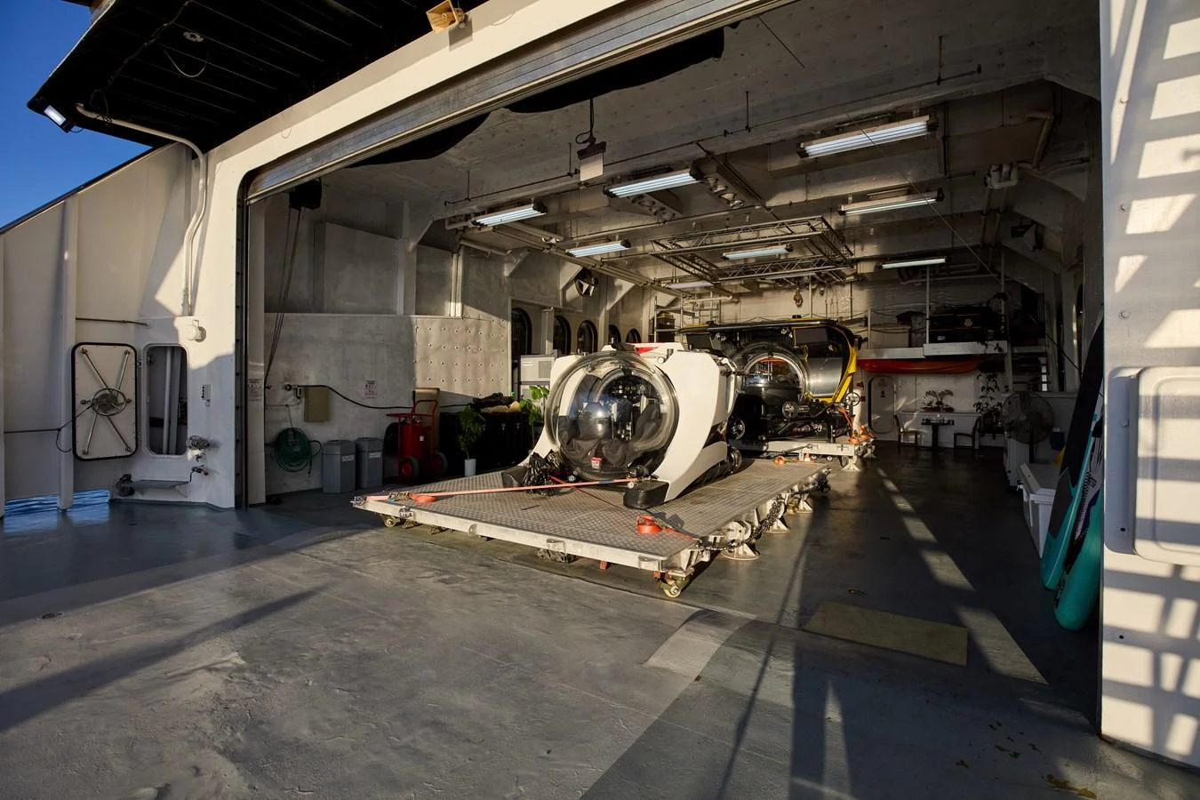 The yacht's garage houses a state-of-the-art submersible for underwater exploration. aboard GLOBAL Yacht for Sale