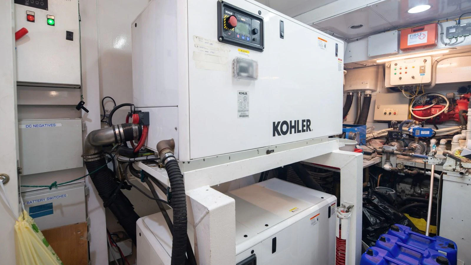 The image showcases the well-equipped engine room with a Kohler generator. aboard MI ALMA Yacht for Sale