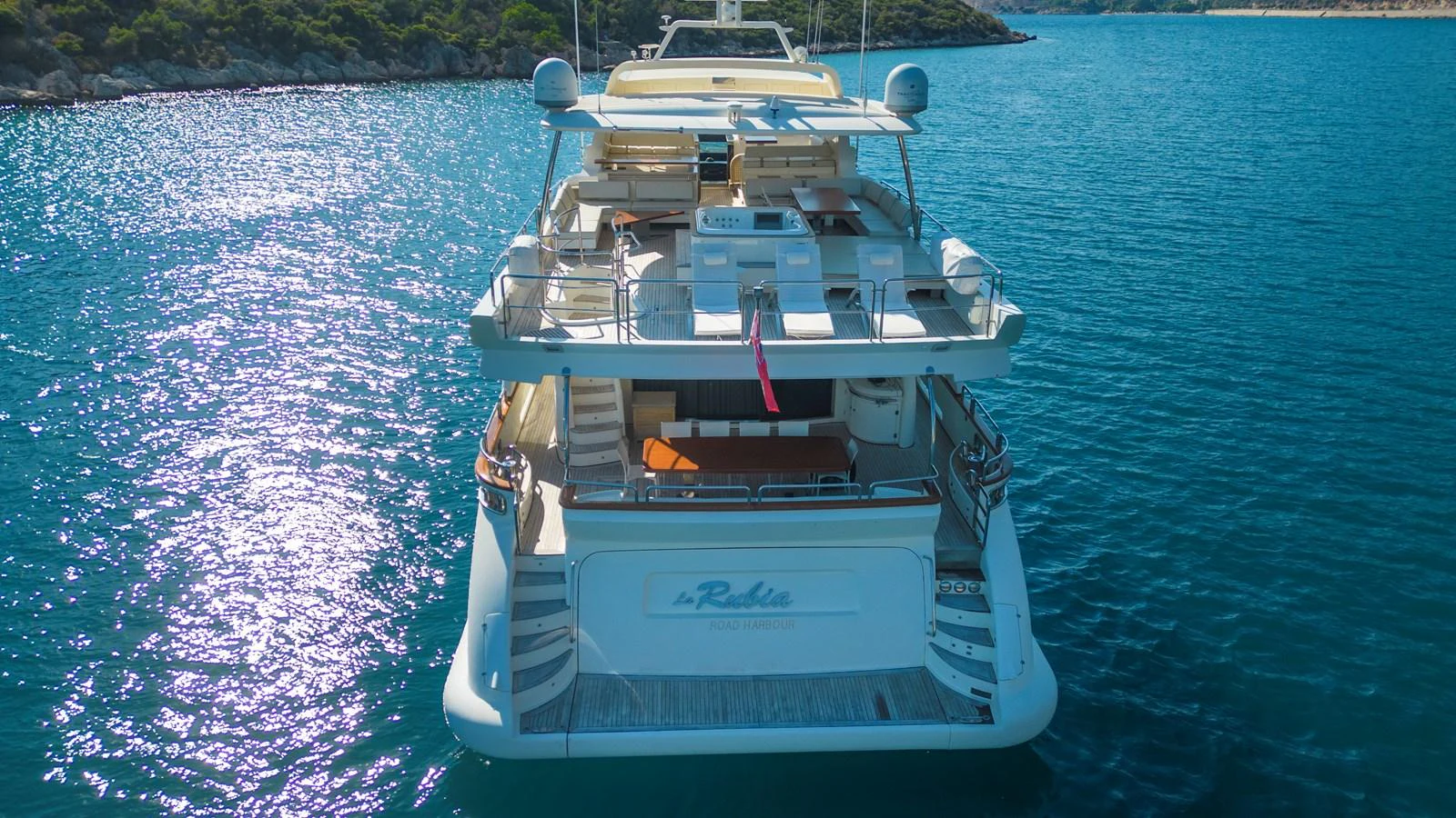 a boat on the water aboard LA RUBIA Yacht for Sale