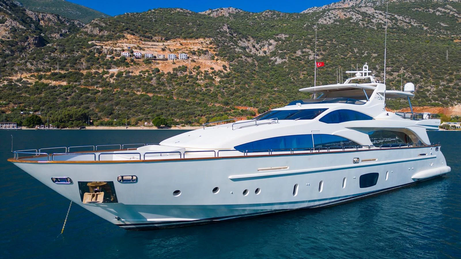 a white yacht in the water aboard LA RUBIA Yacht for Sale