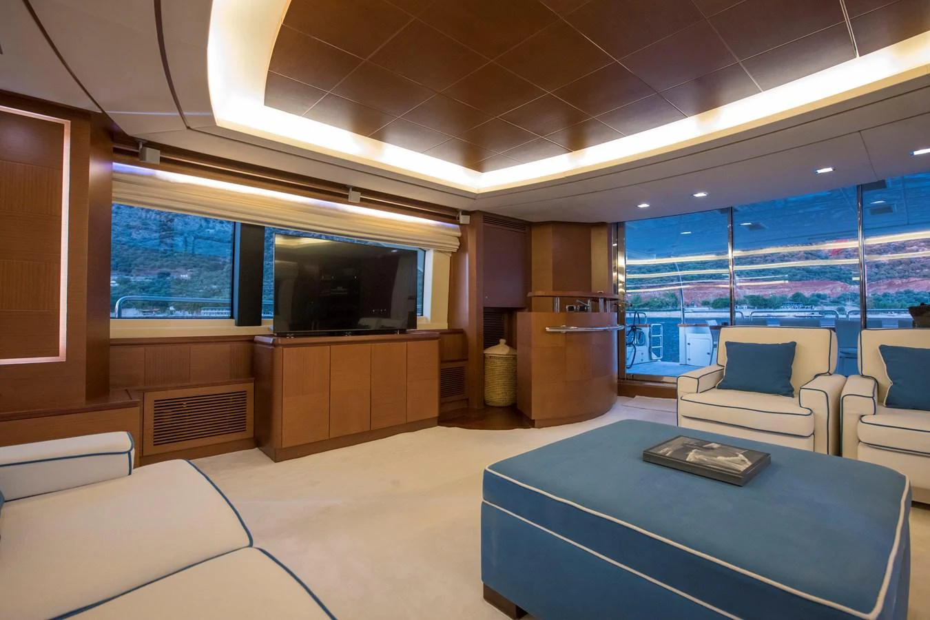 a room with a table and chairs aboard LA RUBIA Yacht for Sale