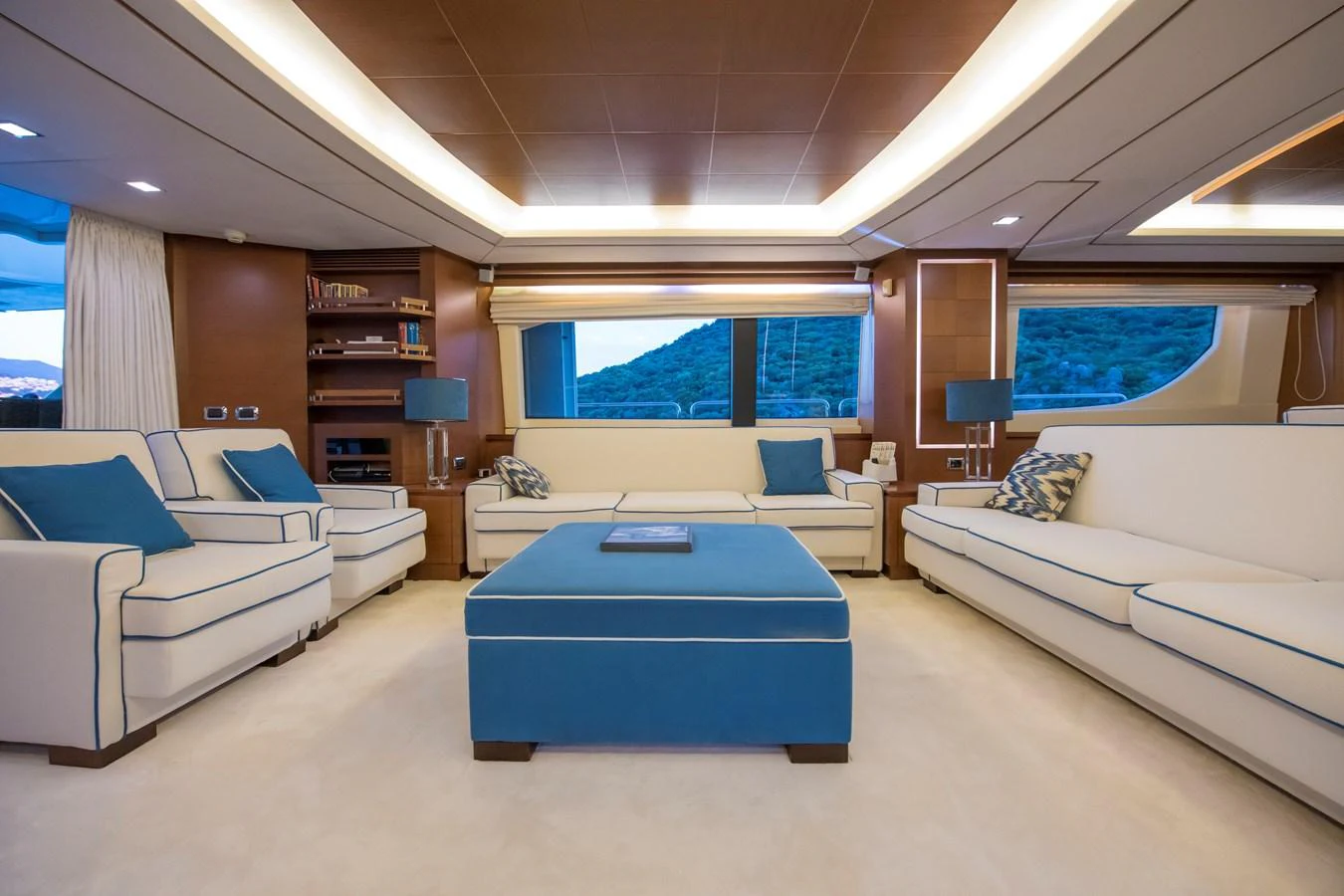 a room with a couch and a table aboard LA RUBIA Yacht for Sale