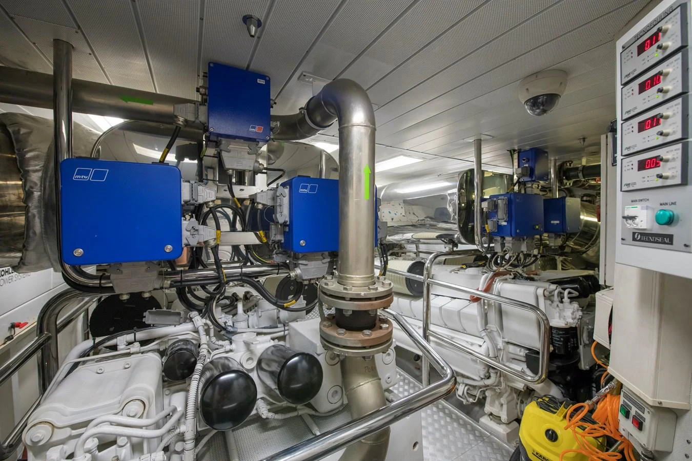 a large machine with blue and white machinery aboard LA RUBIA Yacht for Sale