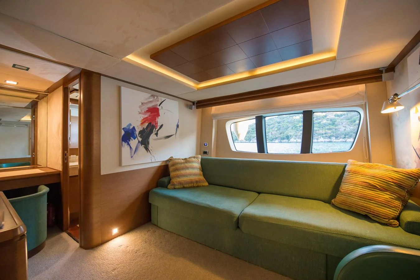 a couch in a room aboard LA RUBIA Yacht for Sale