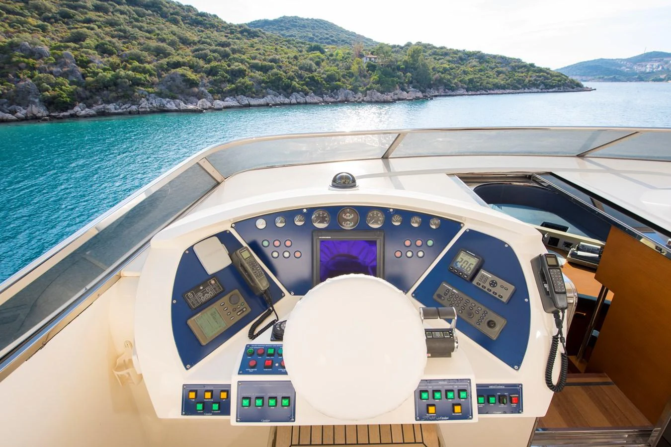 the inside of a cockpit of a plane over a body of water aboard LA RUBIA Yacht for Sale