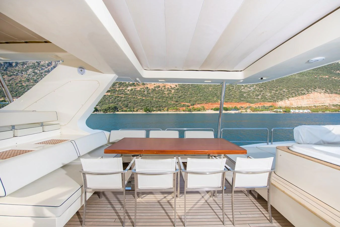 a pool with chairs and tables aboard LA RUBIA Yacht for Sale