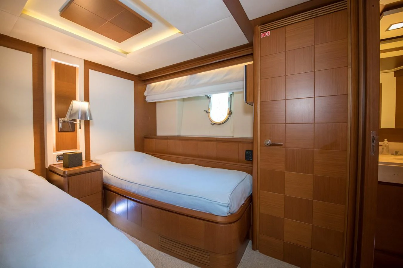 a room with two beds aboard LA RUBIA Yacht for Sale