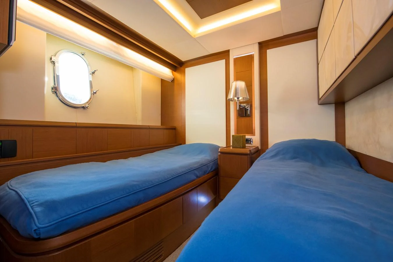 a couple of beds in a room aboard LA RUBIA Yacht for Sale