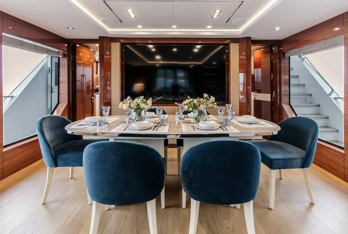 a table set for a dinner aboard PAPILLON Yacht for Sale