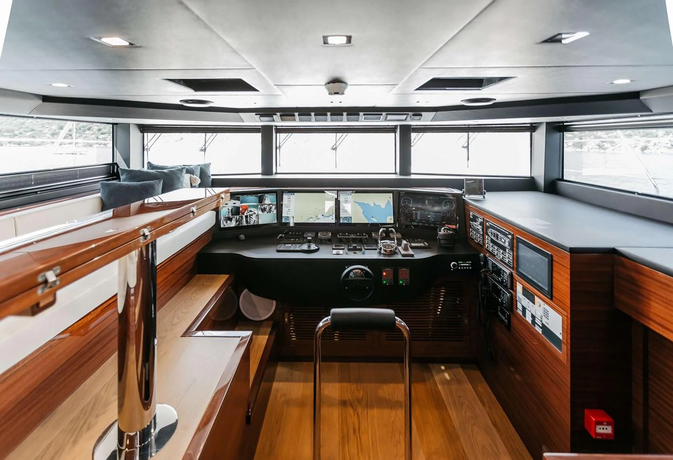 inside of a building with a desk and chairs aboard PAPILLON Yacht for Sale