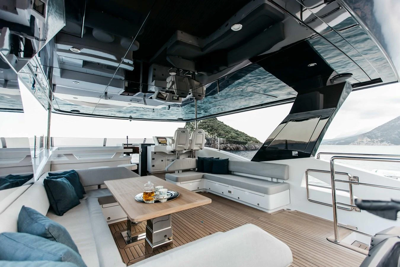 a room with a couch and a table aboard PAPILLON Yacht for Sale