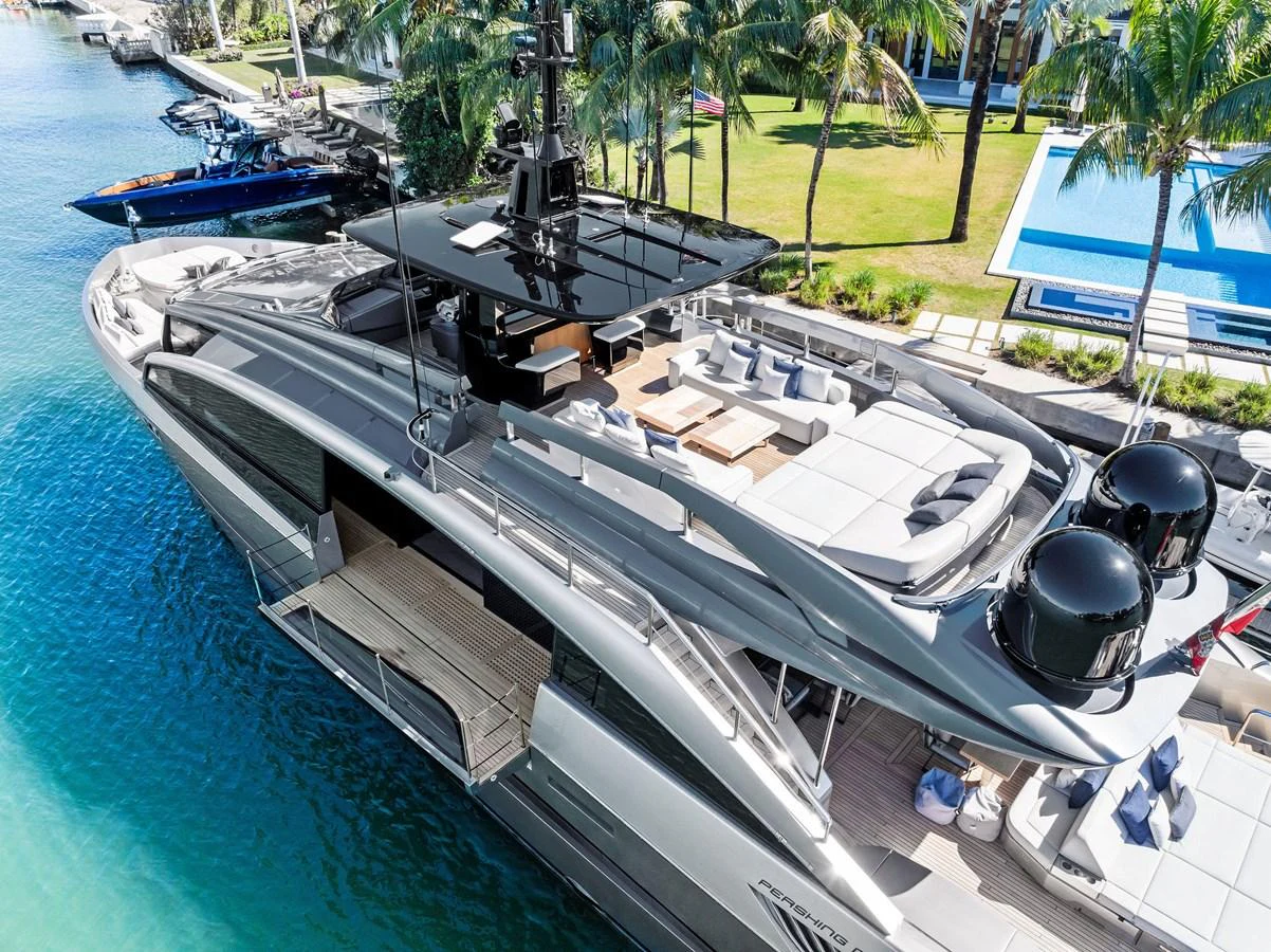 This sleek yacht features a luxurious flybridge with ample seating and sunbathing areas, perfect for relaxation and entertainment. aboard CAFFEINE Yacht for Sale