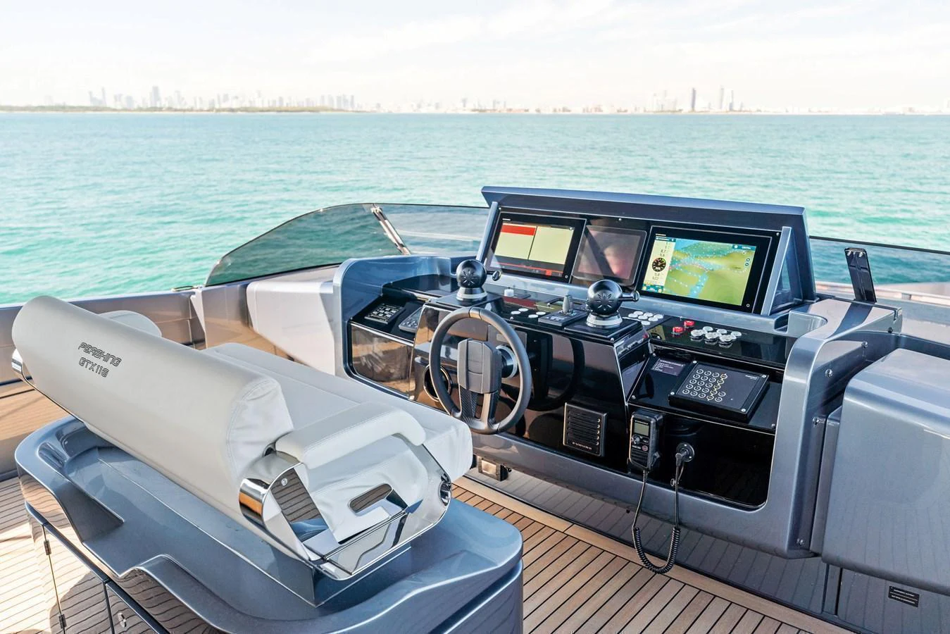 The helm station offers advanced navigation equipment and a sleek, modern design. aboard CAFFEINE Yacht for Sale