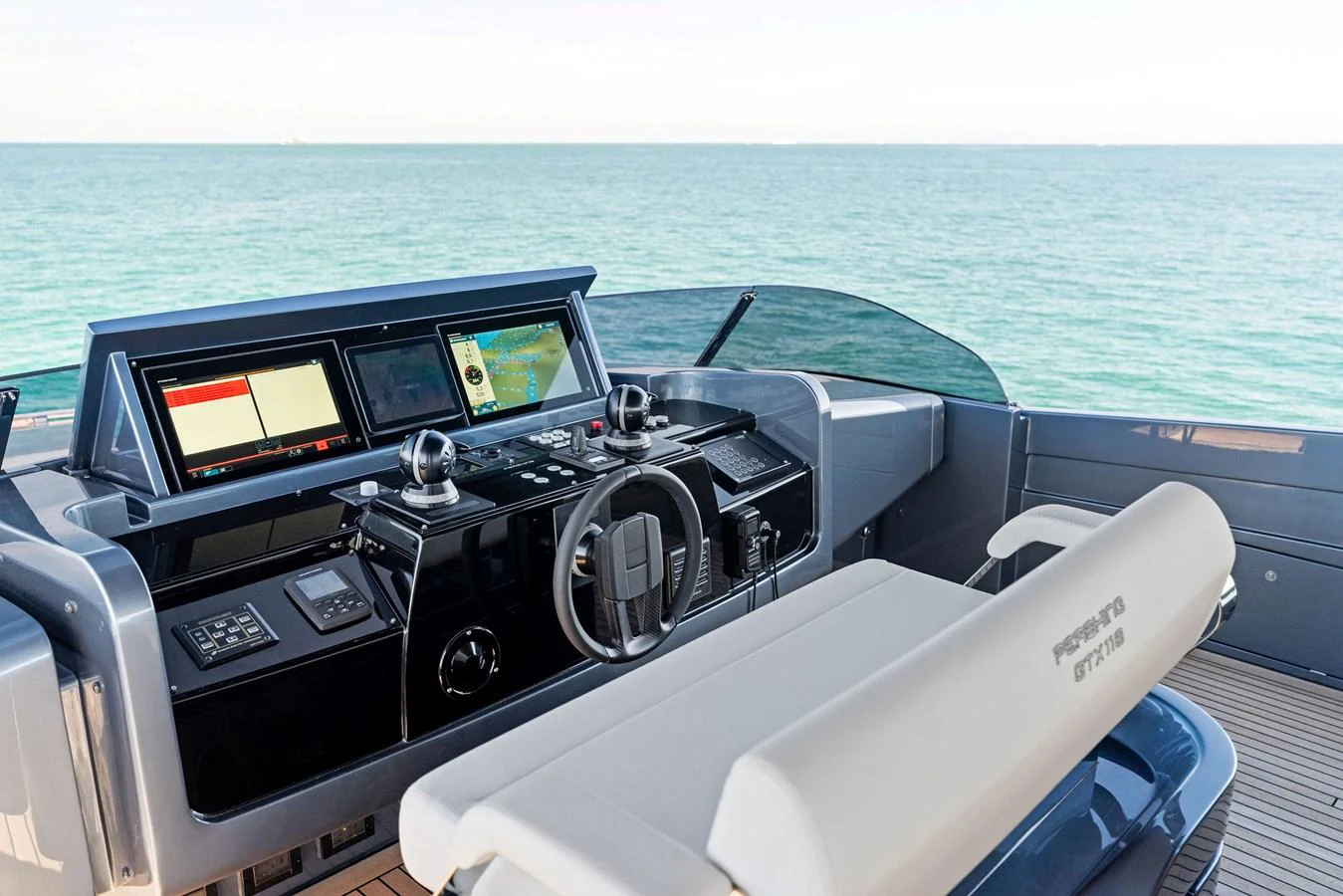 The helm station offers advanced navigation systems with a panoramic view of the sea. aboard CAFFEINE Yacht for Sale
