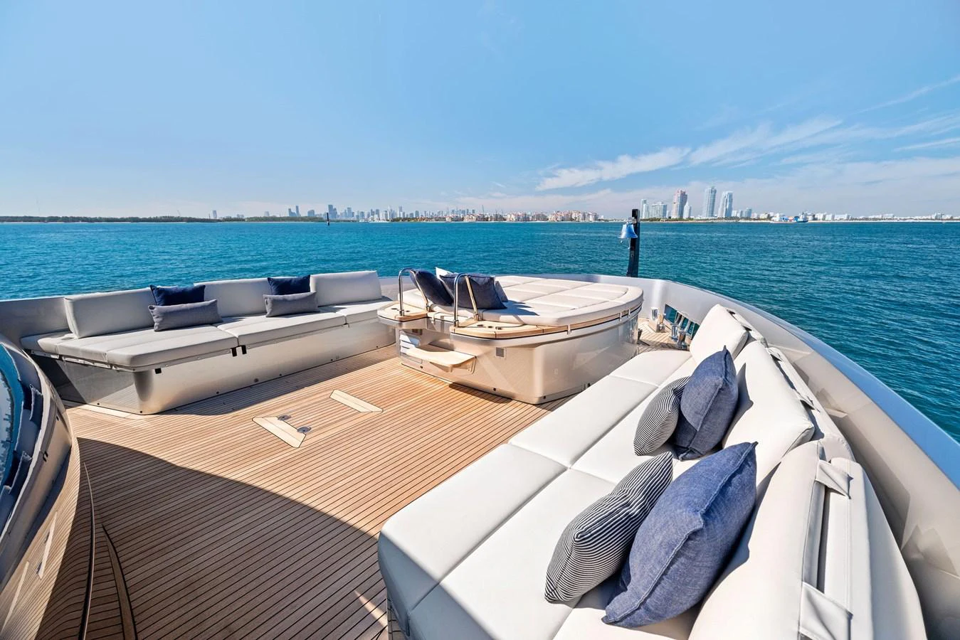 The foredeck offers a spacious sunbathing area with luxurious seating and stunning ocean views. aboard CAFFEINE Yacht for Sale