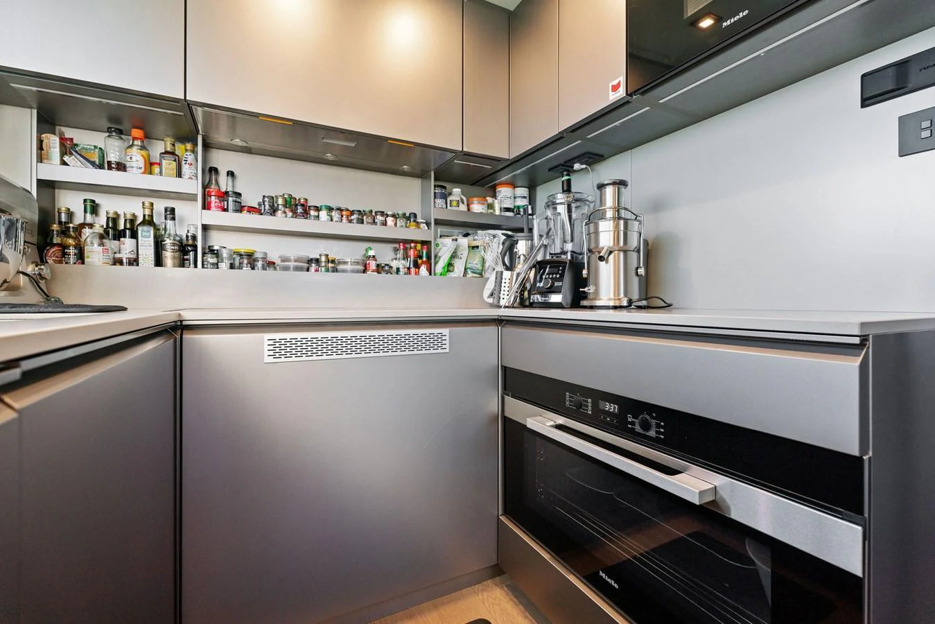 The yacht's galley is equipped with modern appliances and ample storage for a seamless culinary experience. aboard CAFFEINE Yacht for Sale
