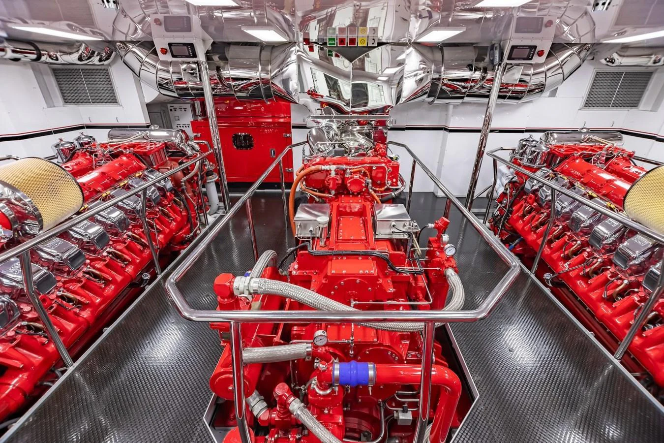 The yacht's engine room showcases powerful, meticulously maintained engines. aboard MYSTIQUE Yacht for Sale