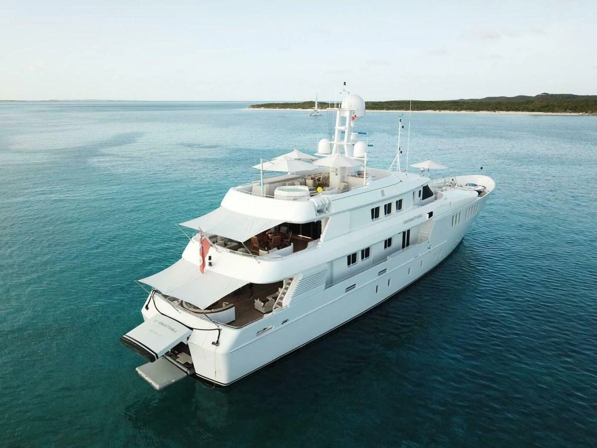 a white boat in the water aboard UNFORGETTABLE Yacht for Sale