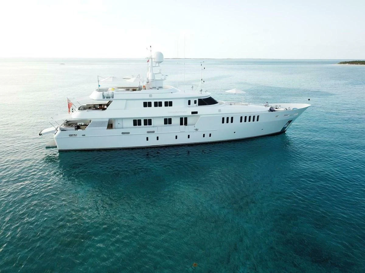 a white yacht in the water aboard UNFORGETTABLE Yacht for Sale