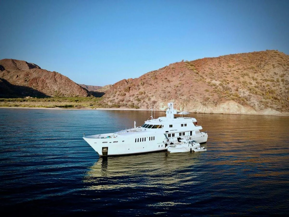 a boat in the water aboard UNFORGETTABLE Yacht for Sale