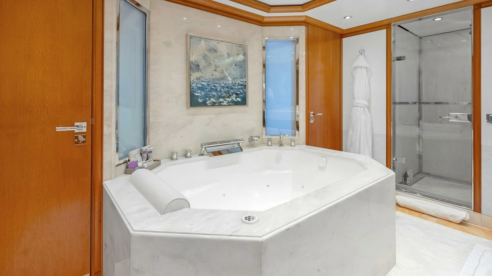 a bathroom with a large bathtub aboard UNFORGETTABLE Yacht for Sale