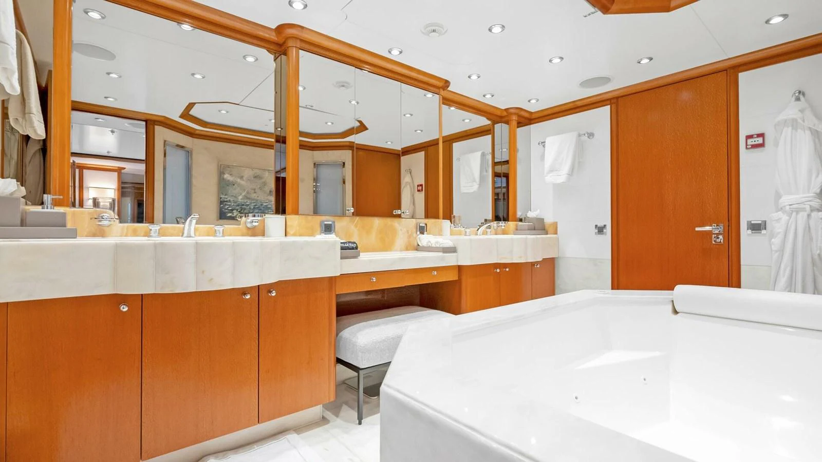 a bathroom with a large mirror aboard UNFORGETTABLE Yacht for Sale