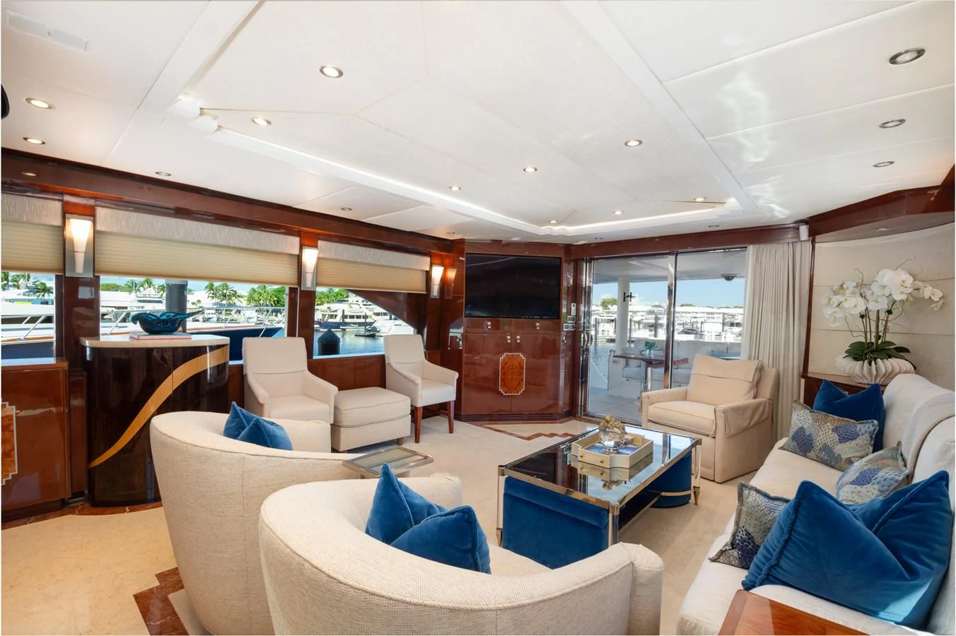 The salon offers a spacious and elegant area for relaxation with plush seating and stylish decor. aboard LUCKY PENNY Yacht for Sale