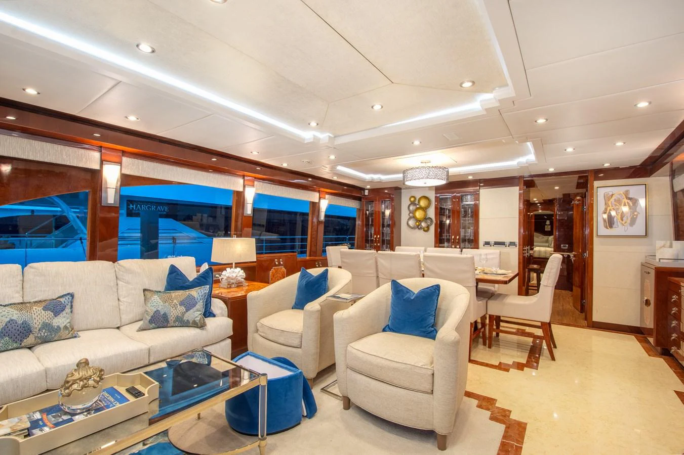 The yacht's salon features luxurious seating and elegant decor, creating a comfortable and stylish living space. aboard LUCKY PENNY Yacht for Sale