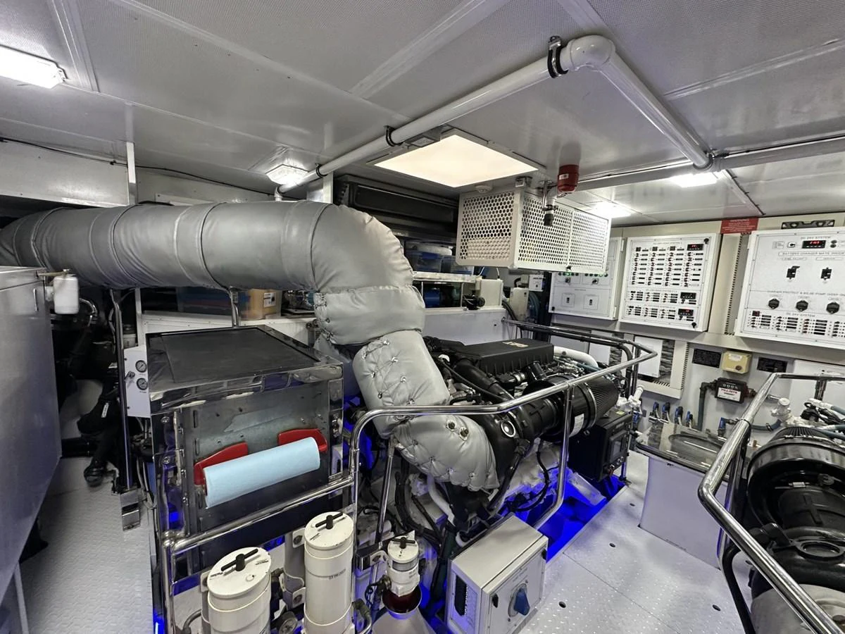 The engine room showcases the yacht's powerful and well-maintained machinery. aboard LUCKY PENNY Yacht for Sale