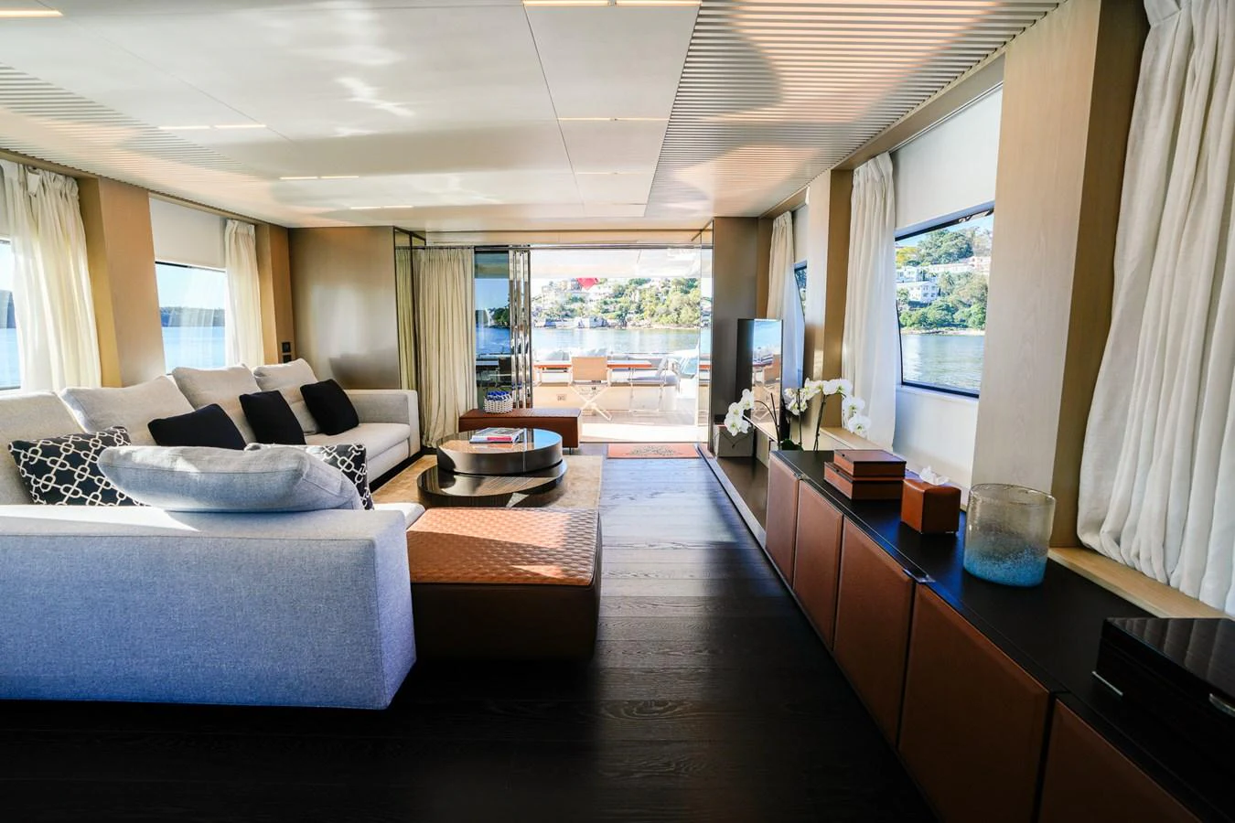 a room with a bed and a table aboard TORO Yacht for Sale
