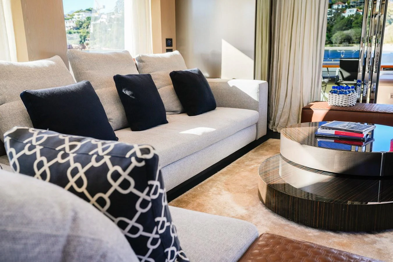 a couch with pillows and pillows aboard TORO Yacht for Sale