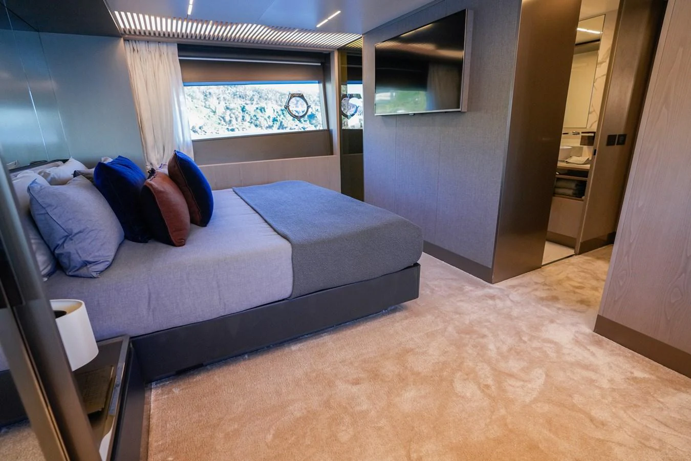 a bed in a room aboard TORO Yacht for Sale