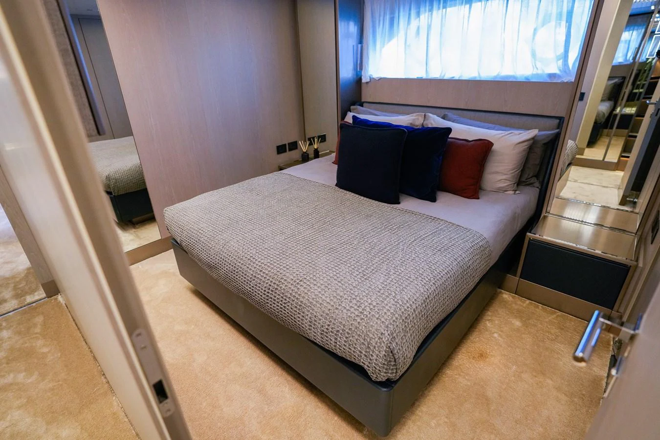 a bed in a room aboard TORO Yacht for Sale