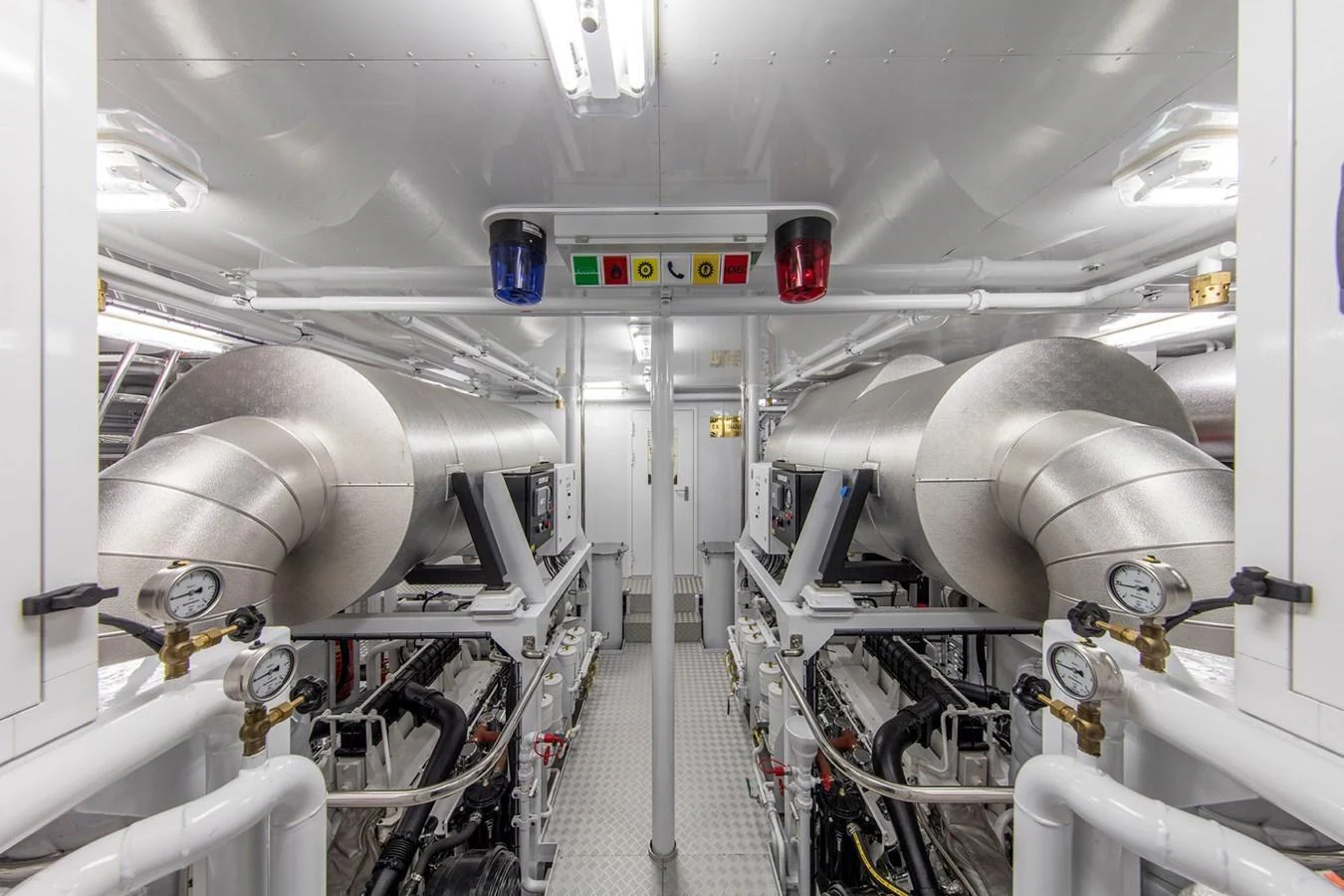 The image showcases the pristine and well-organized engine room of the yacht. aboard JUST J'S Yacht for Sale