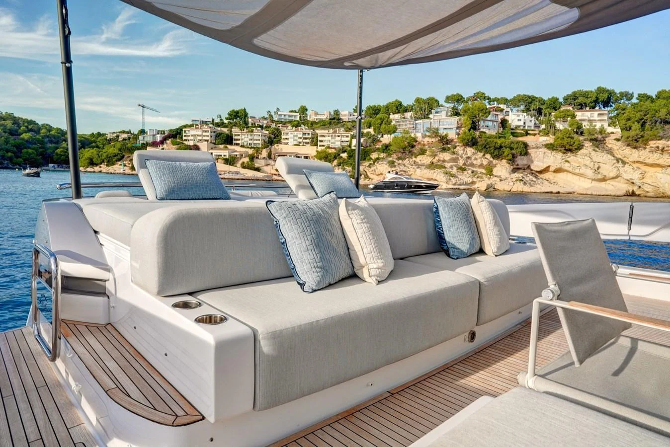 The sundeck features plush seating with scenic coastal views. aboard APRICITY Yacht for Sale