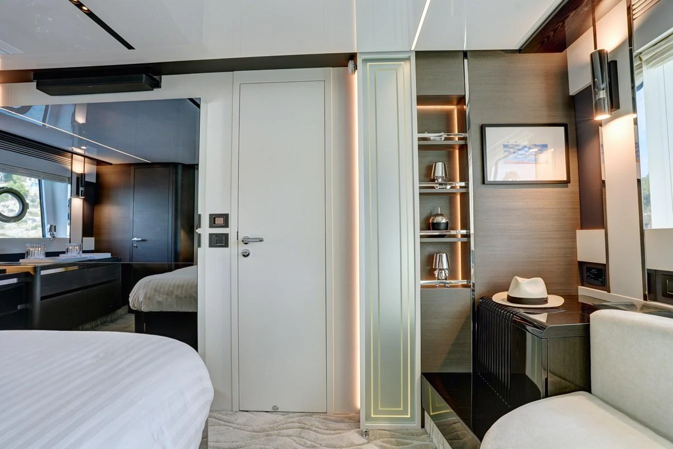 A luxurious stateroom featuring modern decor and elegant furnishings. aboard APRICITY Yacht for Sale