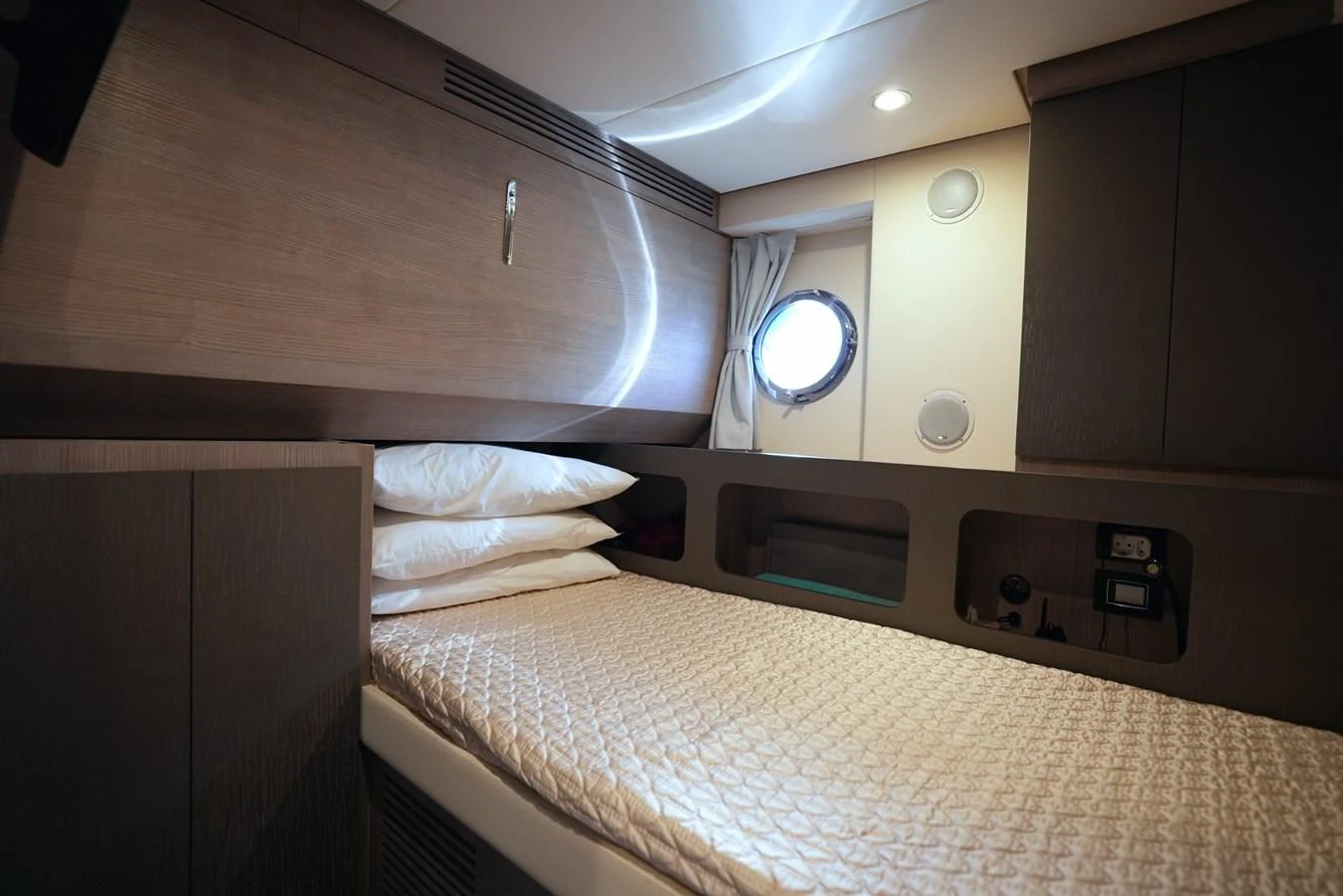 A cozy stateroom with a comfortable bed and modern decor. aboard APRICITY Yacht for Sale