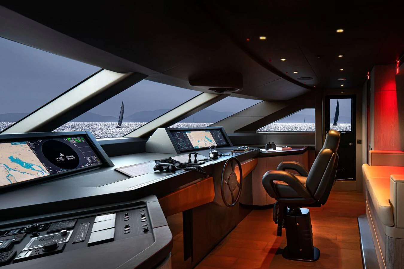 The helm station offers advanced navigation technology and panoramic views for optimal control. aboard MIOTU Yacht for Sale