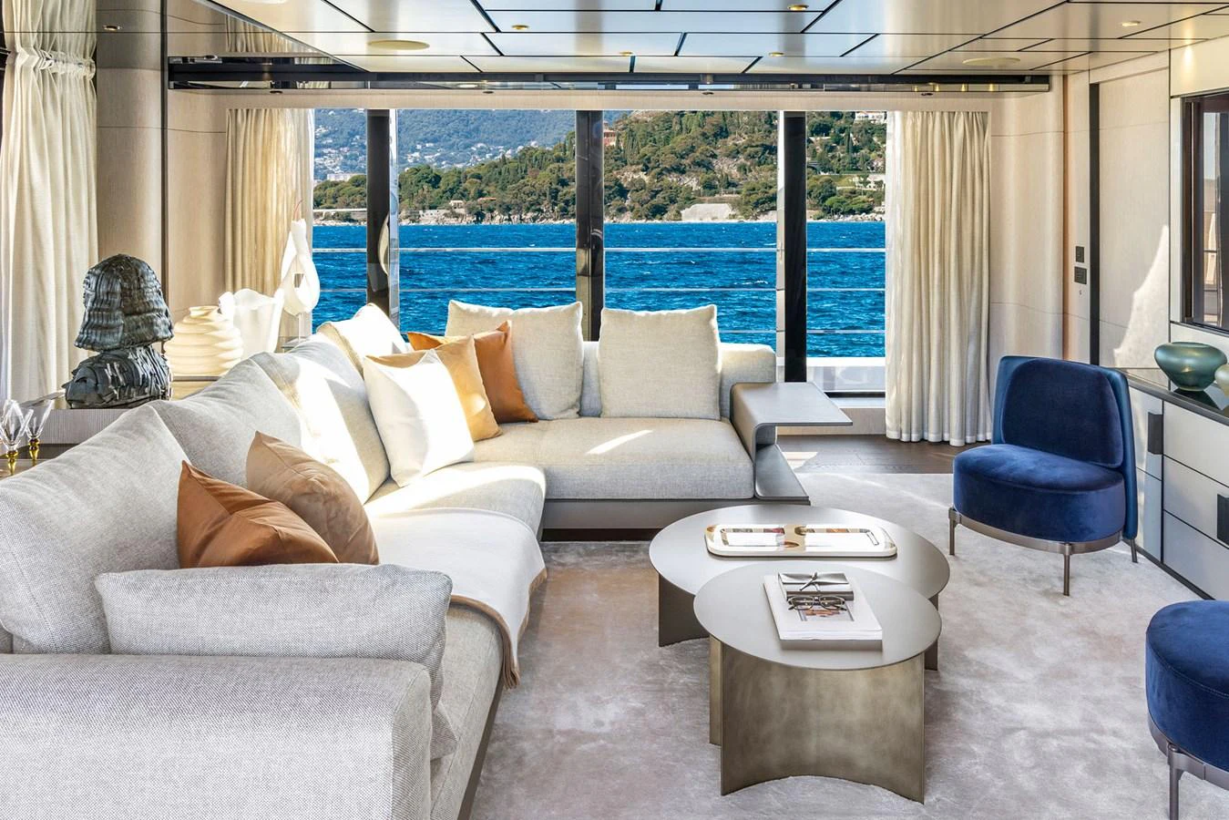 The salon offers a luxurious and comfortable space with stunning views of the sea. aboard MIOTU Yacht for Sale