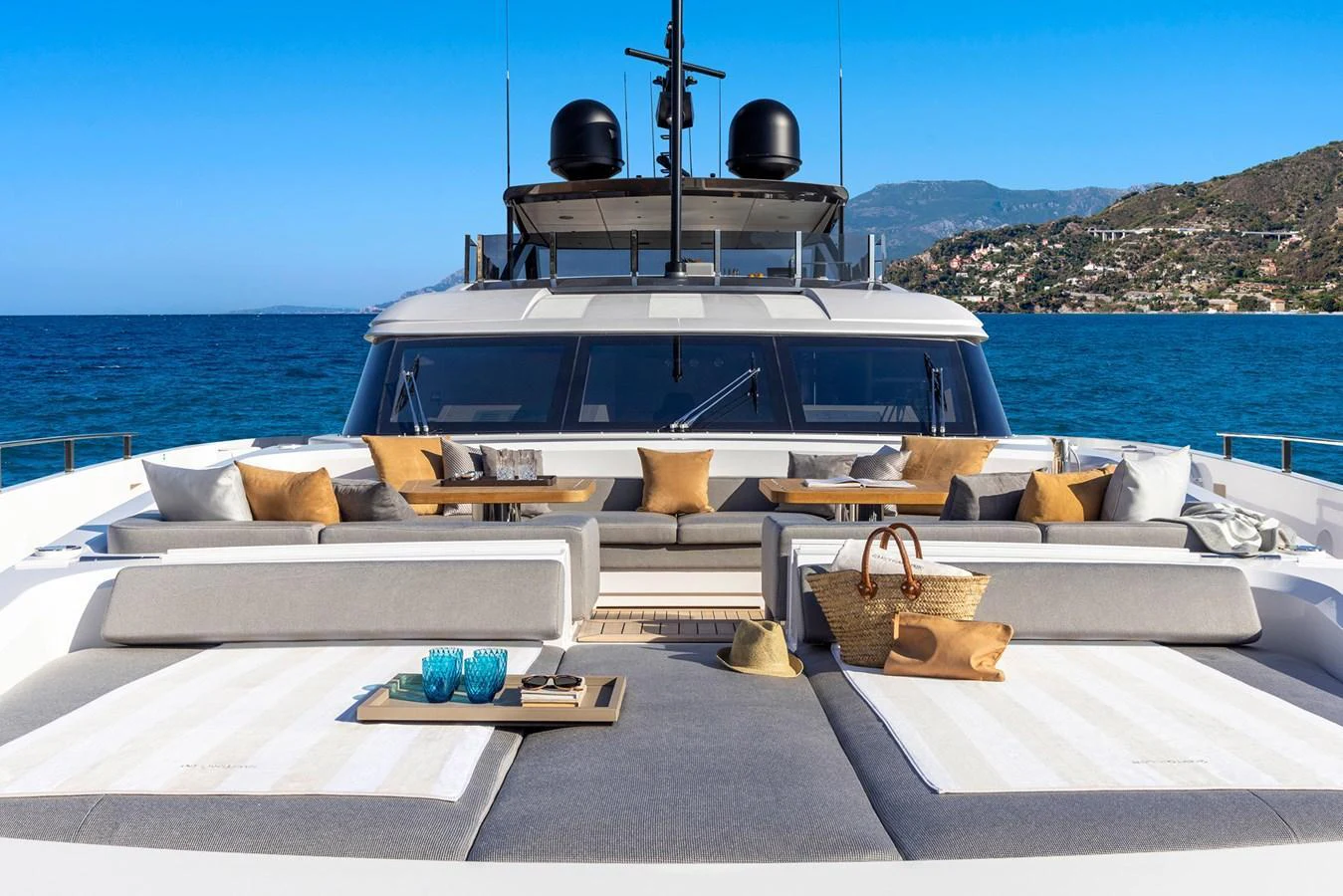 The foredeck offers luxurious lounging areas with stunning sea views. aboard MIOTU Yacht for Sale