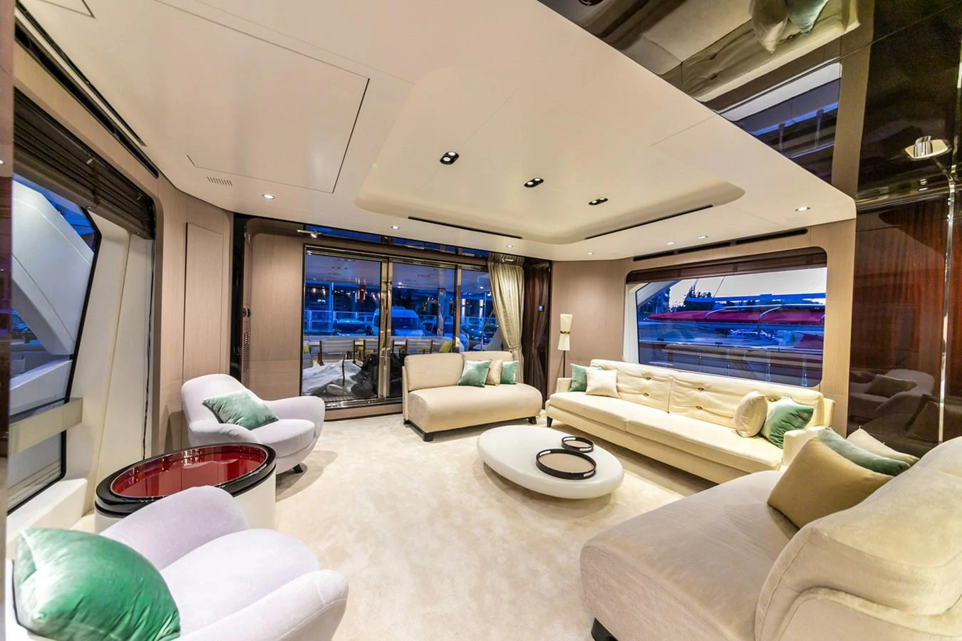 The salon features luxurious seating with a modern and elegant design. aboard NIRVANA BY THE SEA Yacht for Sale