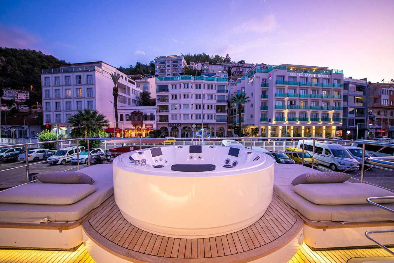 The sundeck features a luxurious jacuzzi with comfortable sun loungers, perfect for relaxation. aboard NIRVANA BY THE SEA Yacht for Sale