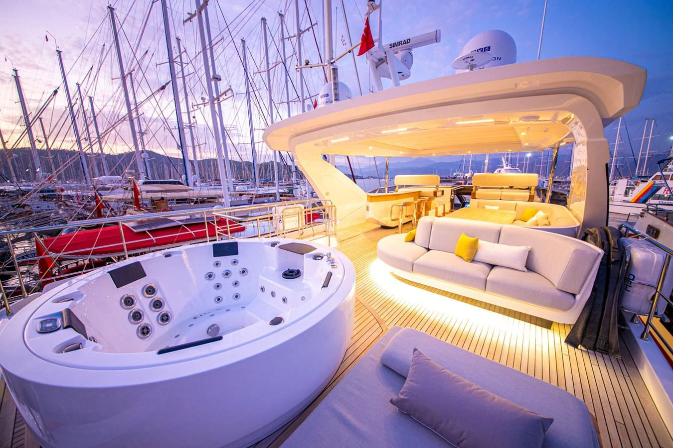The sundeck features a luxurious jacuzzi and comfortable seating area, perfect for relaxation. aboard NIRVANA BY THE SEA Yacht for Sale